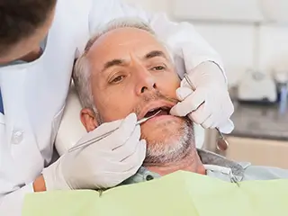 https://glosmileclinic.com/wp-content/uploads/2025/10/Complete-Partial-Dentures.webp